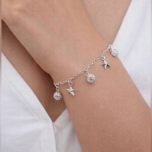 Brand New!! Sterling silver bracelet with stars and wire sphere